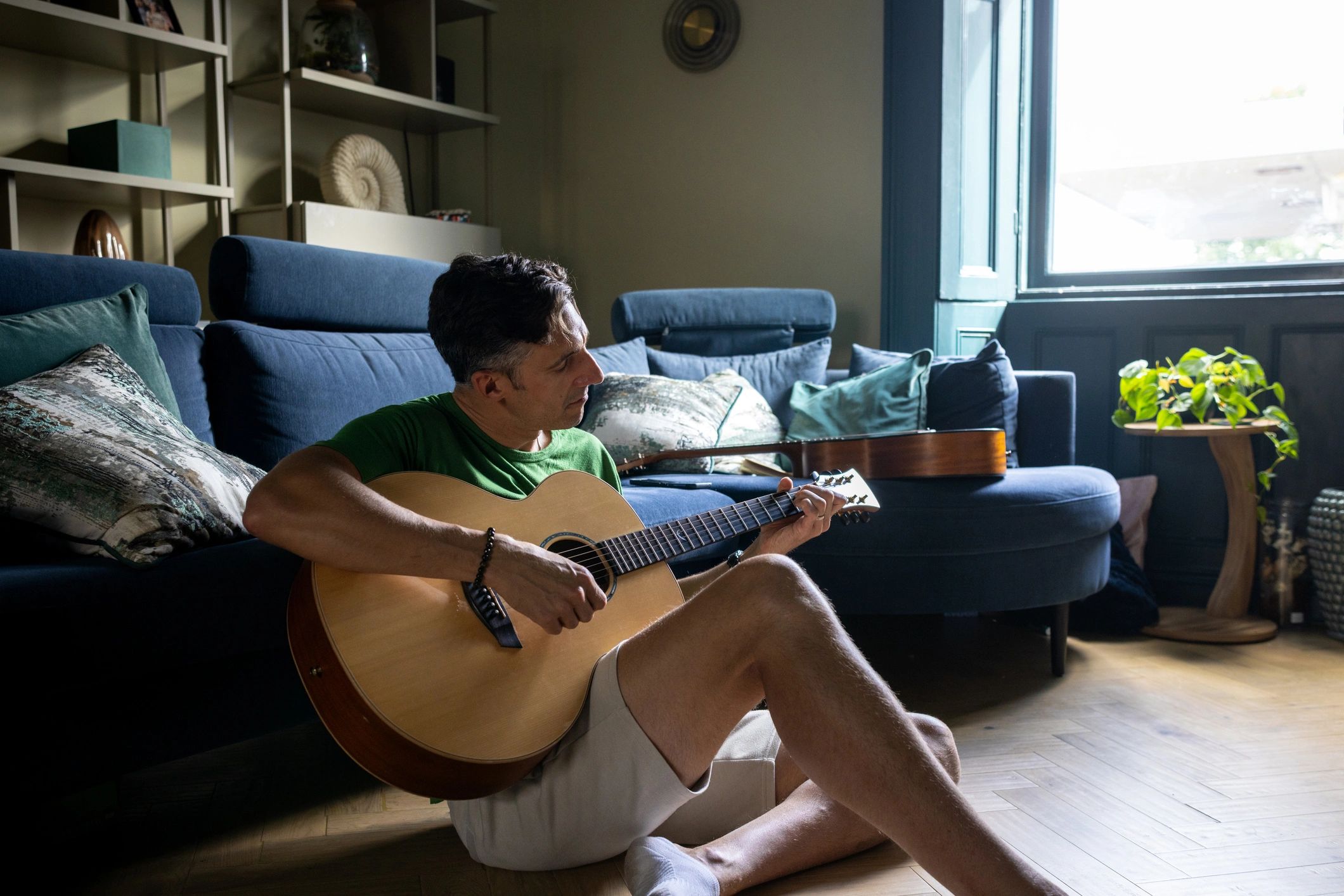 Guitarist performing in an intimate setting